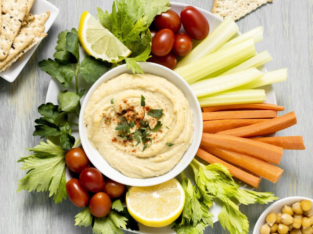 top view hummus with assortment vegetables 1 scaled 1